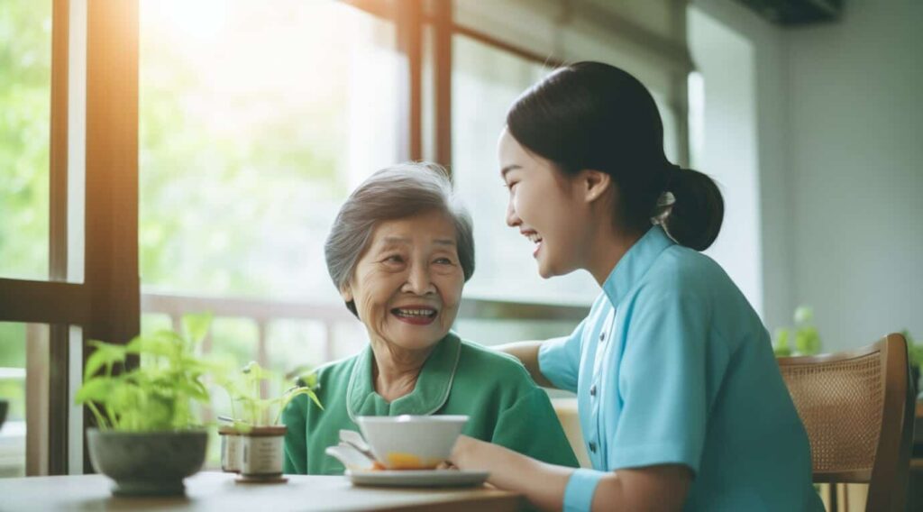 A personal care attendant taking care of an elderly client